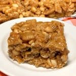 Square piece of Pay Day Crunch on a white plate