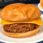 Homemade sloppy joe sandwich on a white plate