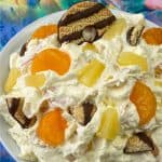 Striped Keebler Fudge cookies in a fruit salad with pineapple tidbits and mandarin oranges