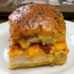 Chicken slider with cheese, bacon and ranch dressing on a Hawaiian roll with poppyseed glaze