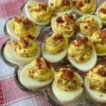 Egg tray filled with BLT deviled eggs