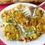 Slices of zucchini mixed in with shredded carrots, chicken stuffing, sour cream and cream of chicken soup