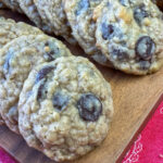 Dark chocolate chips speckling a few delicious oatmeal cookies.
