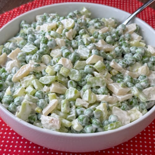 An Asian twist of chopped water chestnuts stirred into celery, onions and peas in a light, creamy mayo and sour cream sauce.