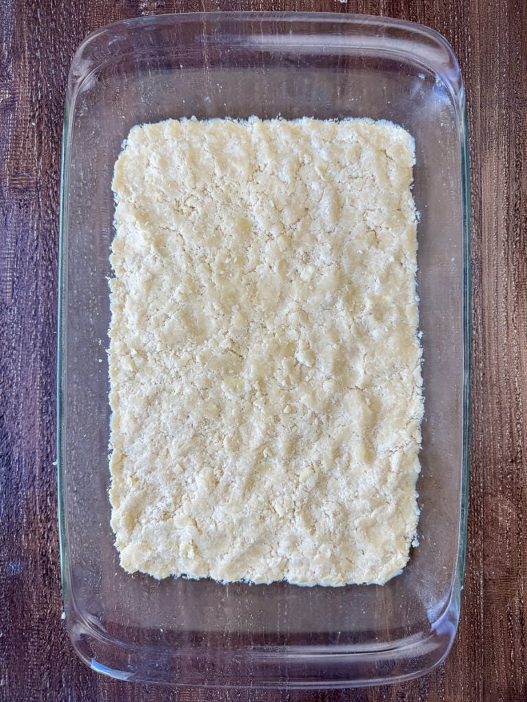 Flaky crust pressed into a glass 9 x 13" pan.