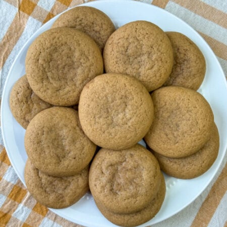 Close up layers of delicious caramel cookies on a plate.