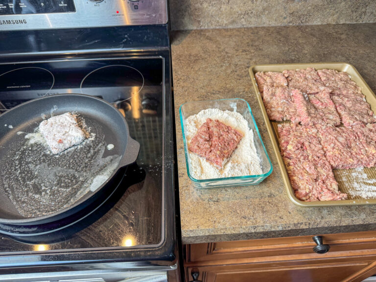 Steps to prepare the Amish hamburger steaks to coat in flour and get ready to bake on a counter top and in a butter filled skillet on the stove top.